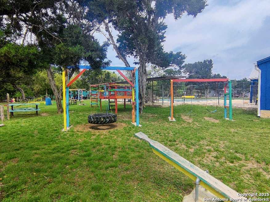 157 Hillside Road Bandera, TX 78003 - Photo 24 of 27 a view of a park with slide
