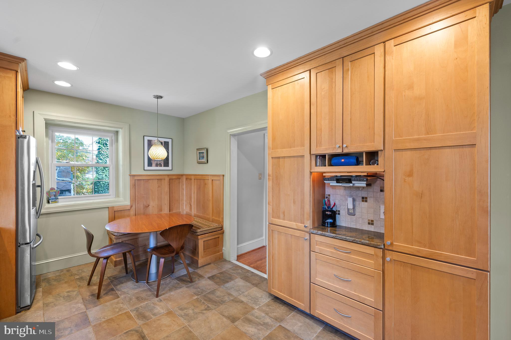 7 West Amherst Road Bala Cynwyd, PA 19004 - Photo 14 of 40 a kitchen with kitchen island table and chairs