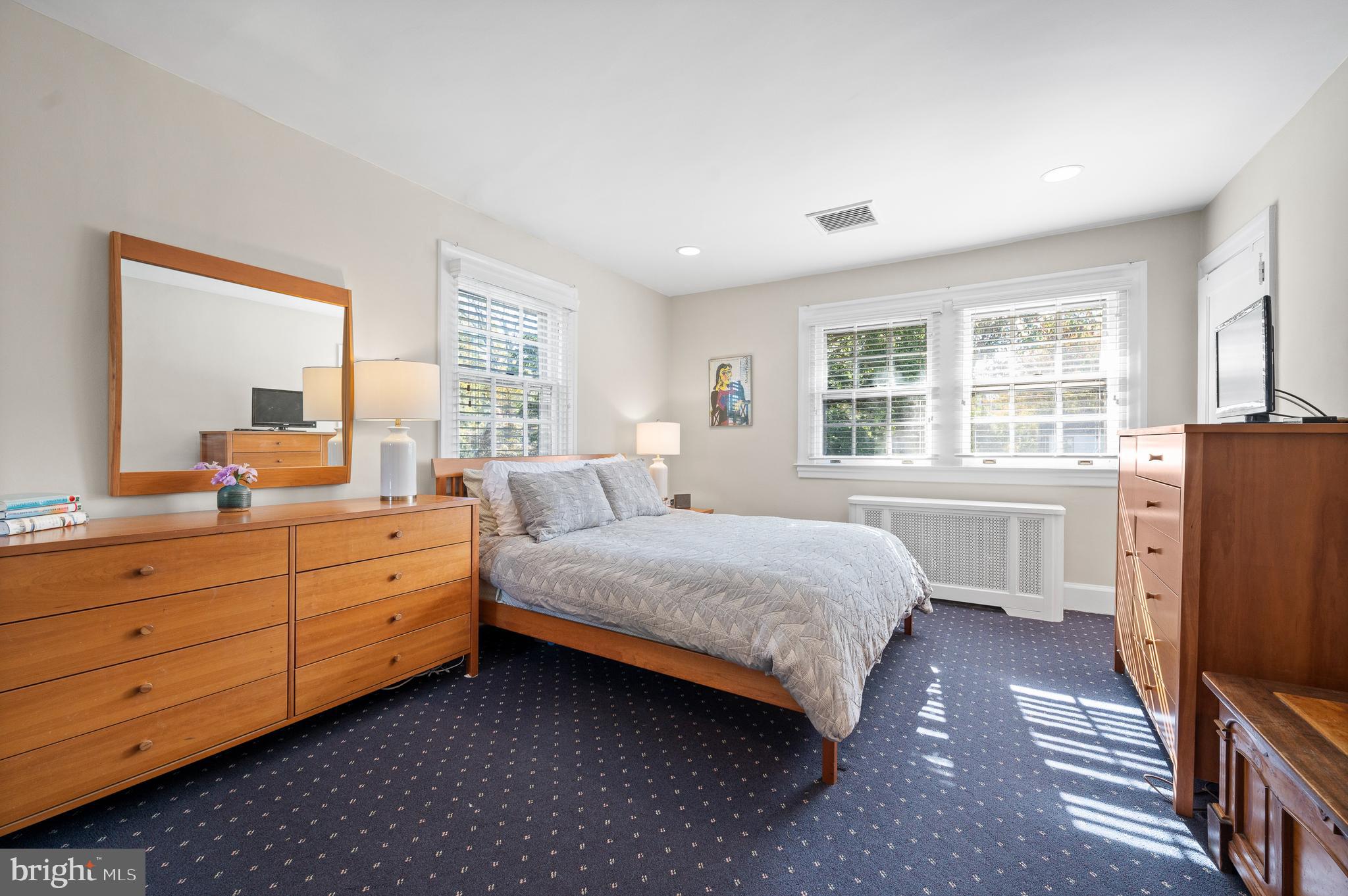 7 West Amherst Road Bala Cynwyd, PA 19004 - Photo 23 of 40 a bedroom with a bed dresser and a large window