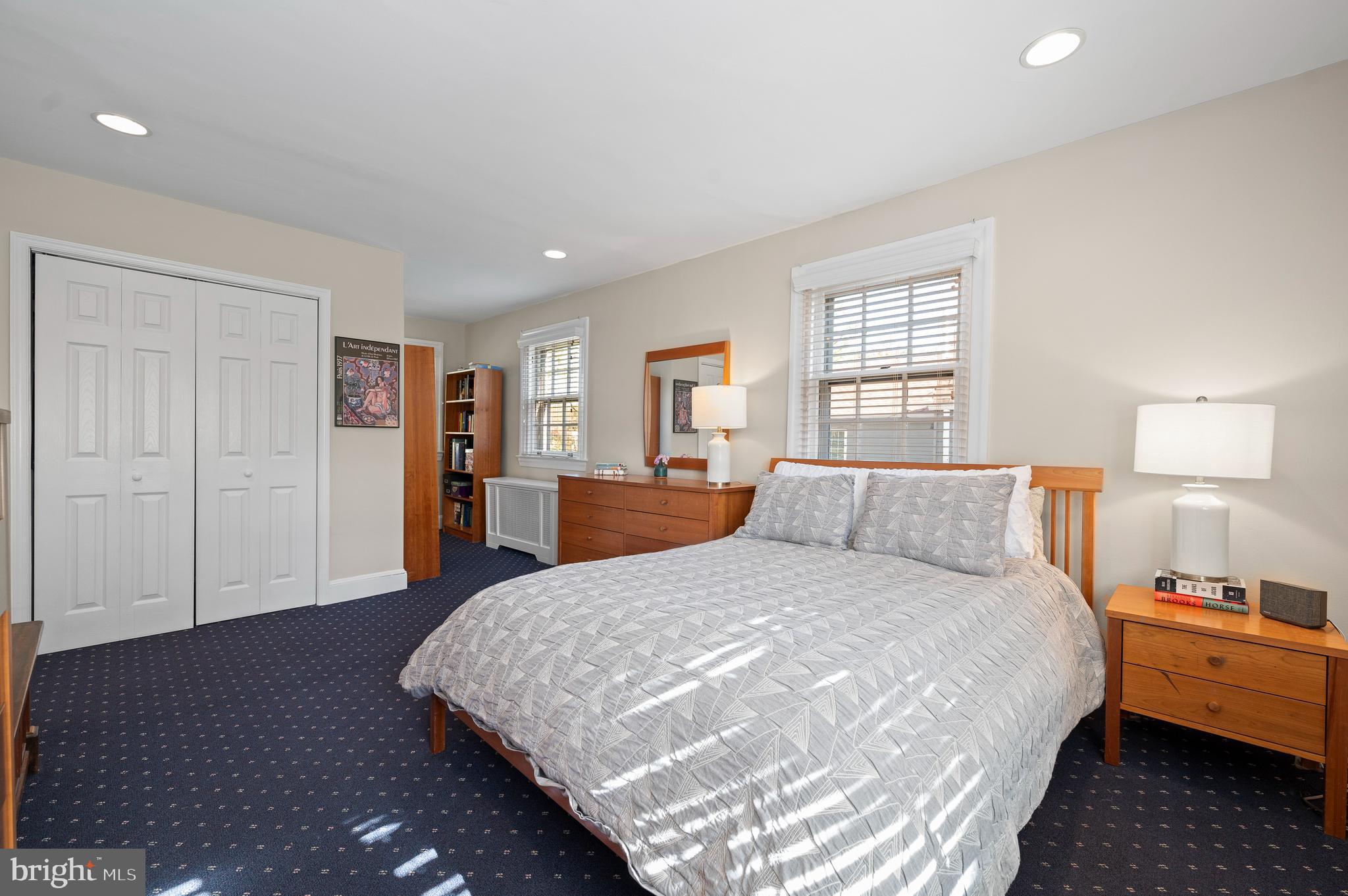 7 West Amherst Road Bala Cynwyd, PA 19004 - Photo 24 of 40 a large bedroom with a bed and wooden floor