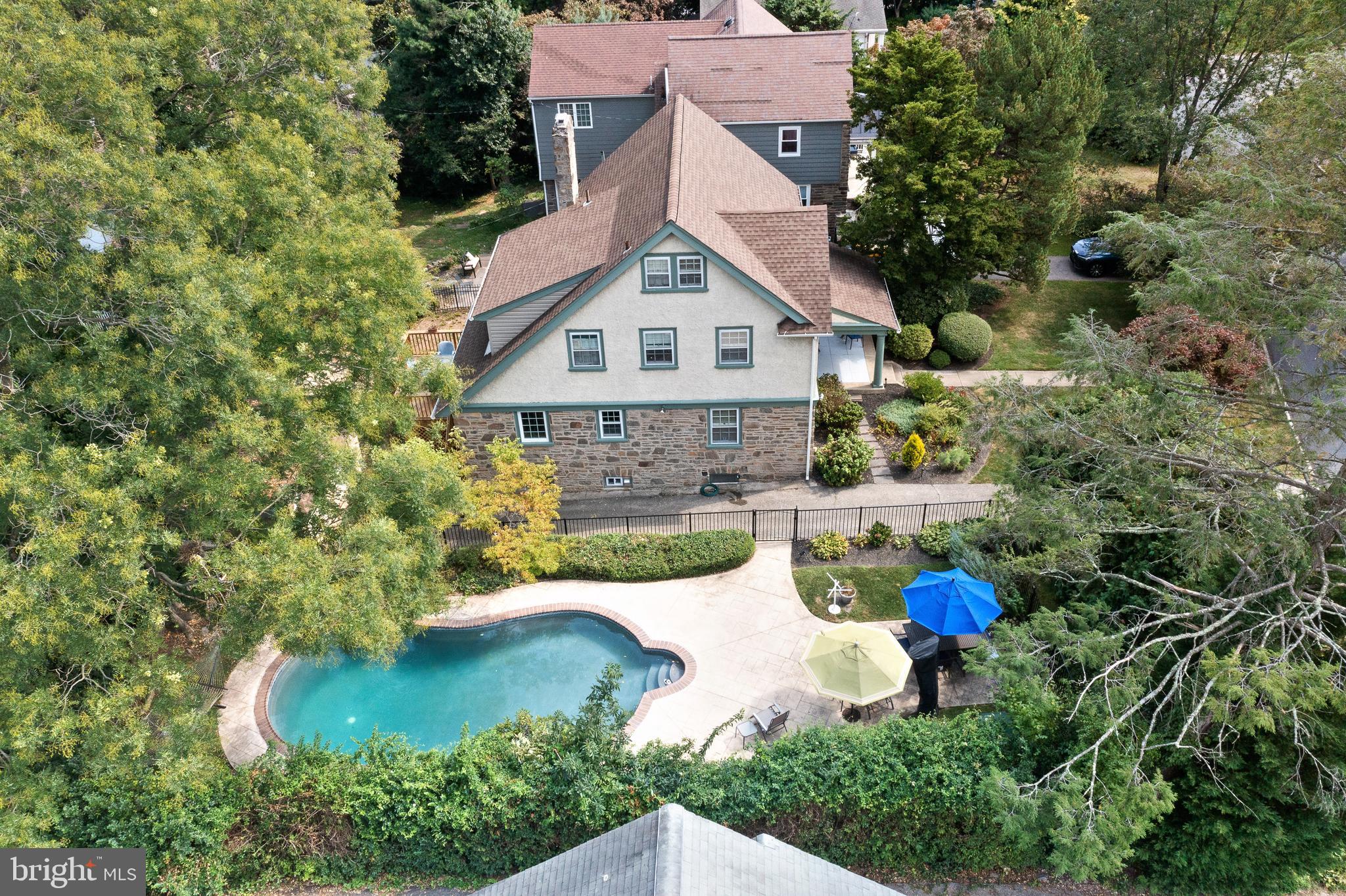 7 West Amherst Road Bala Cynwyd, PA 19004 - Photo 3 of 40 a view of a house with a yard and potted plants