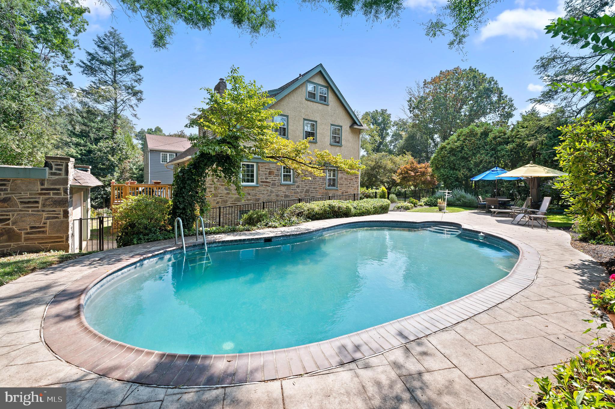 7 West Amherst Road Bala Cynwyd, PA 19004 - Photo 35 of 40 a view of a swimming pool with a garden