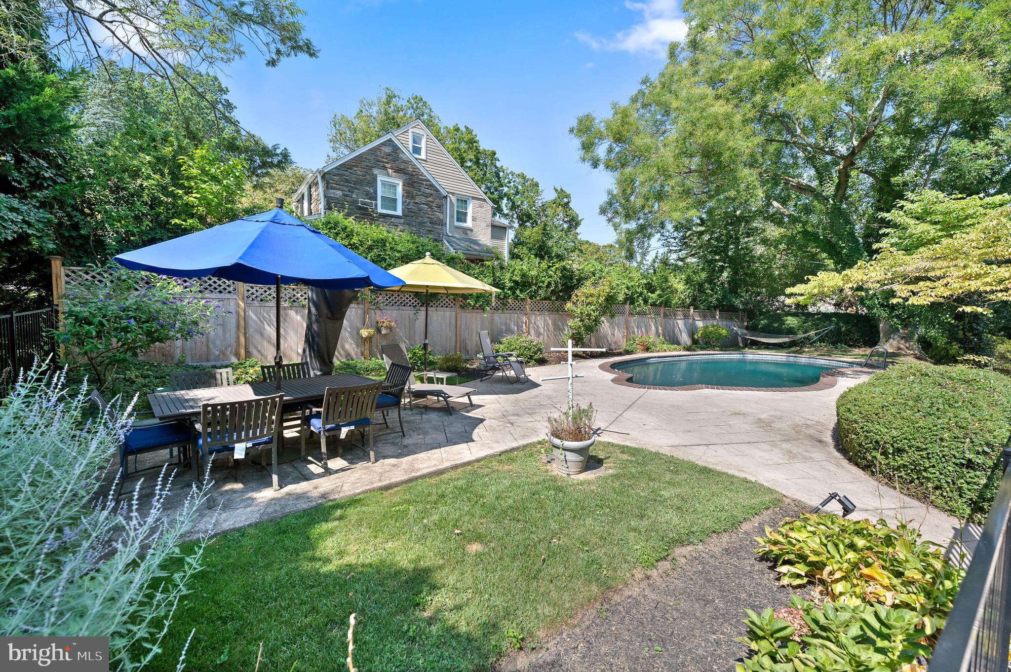 7 West Amherst Road Bala Cynwyd, PA 19004 - Photo 4 of 40 a view of backyard with outdoor seating and green space