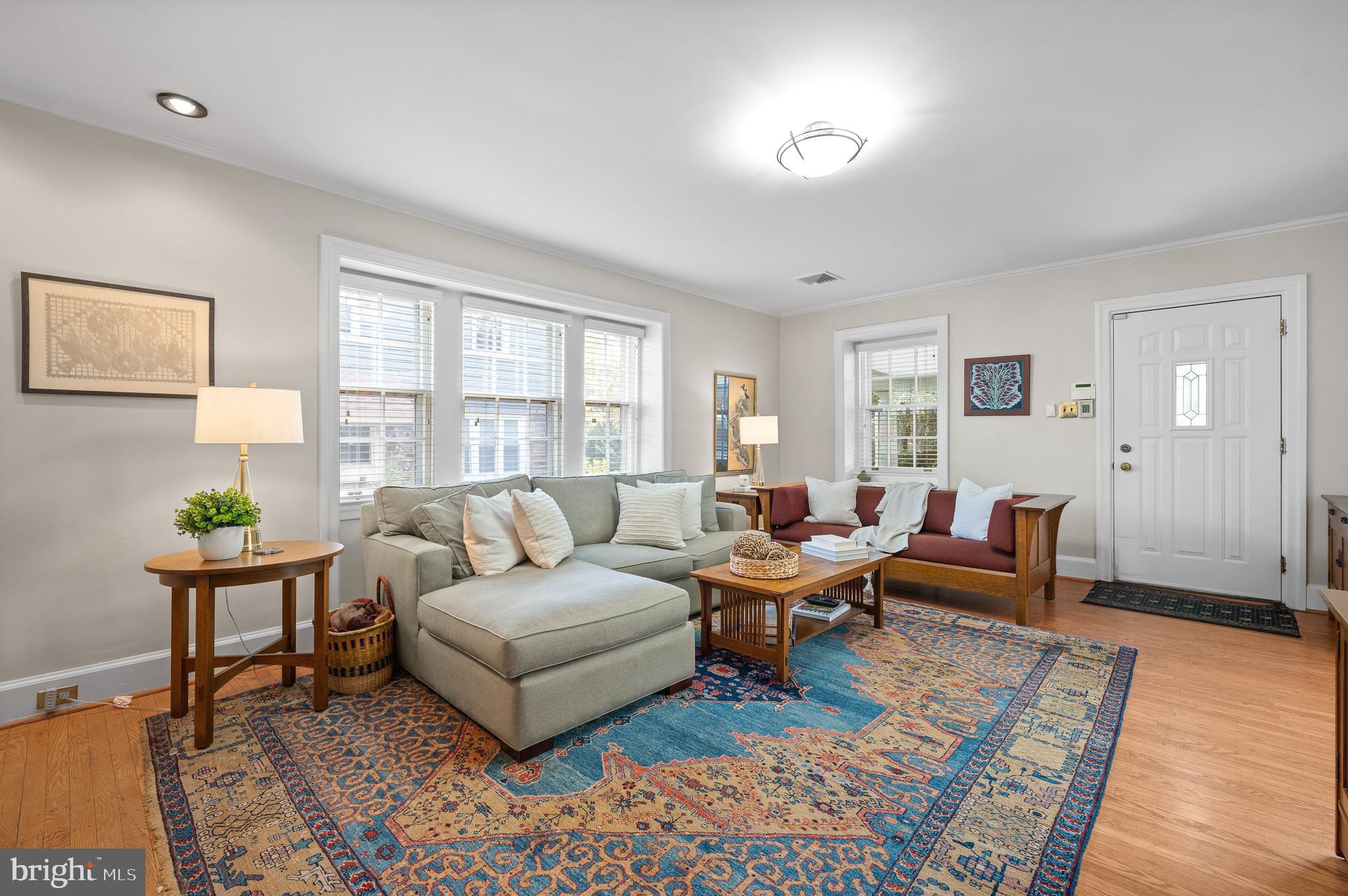 7 West Amherst Road Bala Cynwyd, PA 19004 - Photo 6 of 40 a living room with furniture a lamp and a table