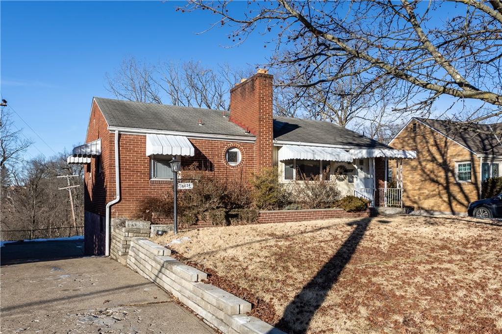 2038 Borland Road Pittsburgh, PA 15243 - Photo 3 of 25 front view of a house with a yard