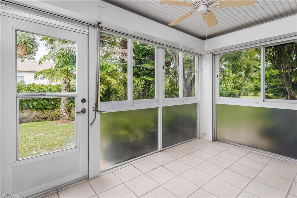 28 Watercolor Way, Unit 28 Naples, FL 34113 - Photo 13 of 29 a view of an empty room with a window