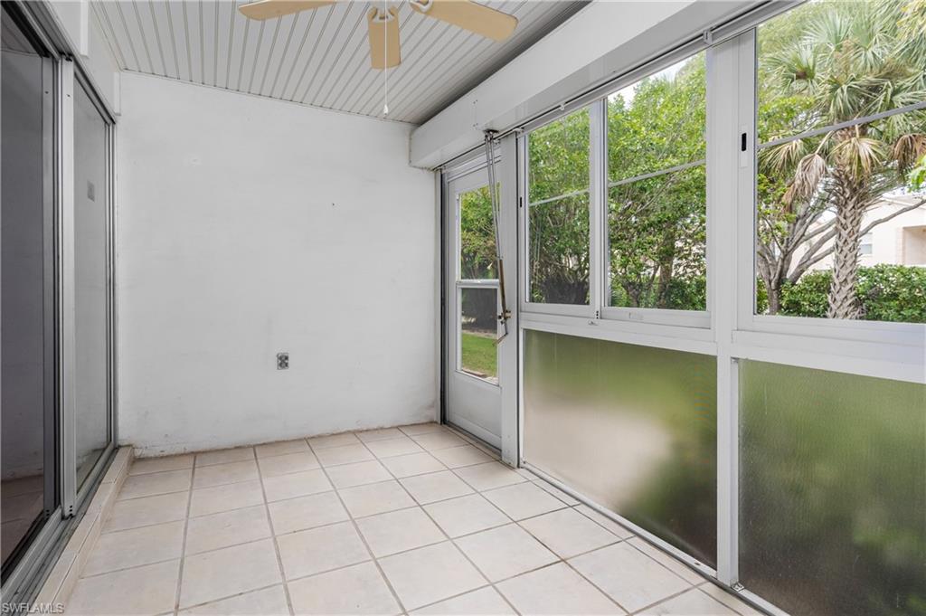 28 Watercolor Way, Unit 28 Naples, FL 34113 - Photo 14 of 29 a view of an empty room with a window