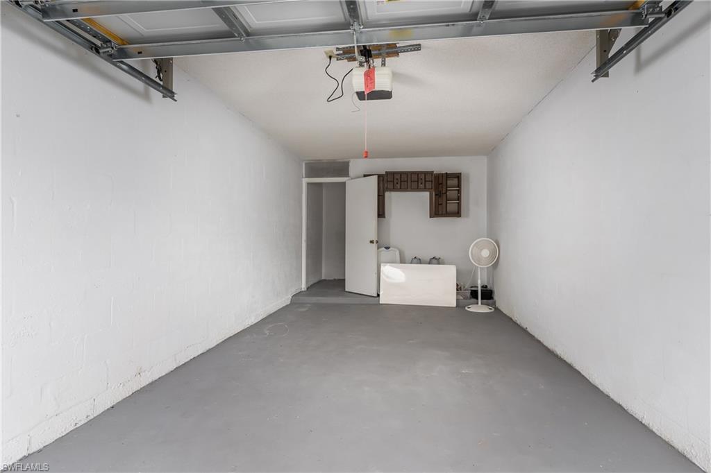 28 Watercolor Way, Unit 28 Naples, FL 34113 - Photo 21 of 29 a view of a room with a ceiling fan