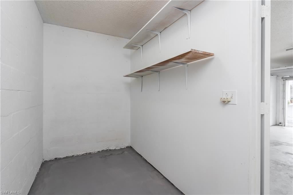 28 Watercolor Way, Unit 28 Naples, FL 34113 - Photo 22 of 29 a view of walk in closet