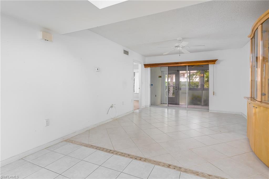 28 Watercolor Way, Unit 28 Naples, FL 34113 - Photo 5 of 29 an empty room with entrance door