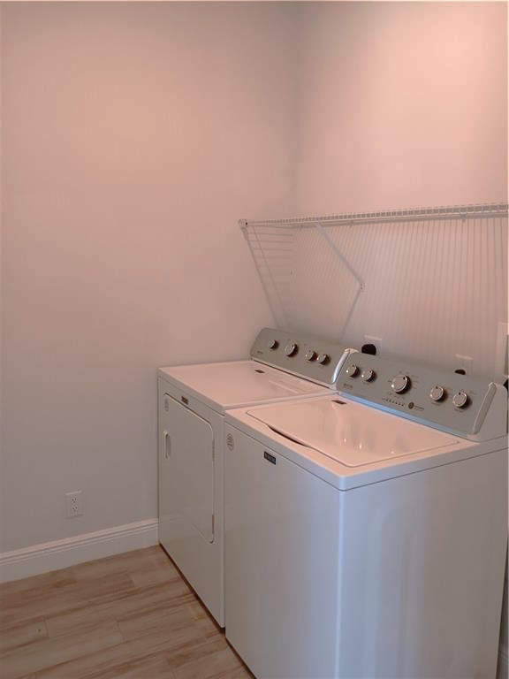 2121 Bridgehampton Terrace Vero Beach, FL 32966 - Photo 28 of 33 a utility room with dryer and washer