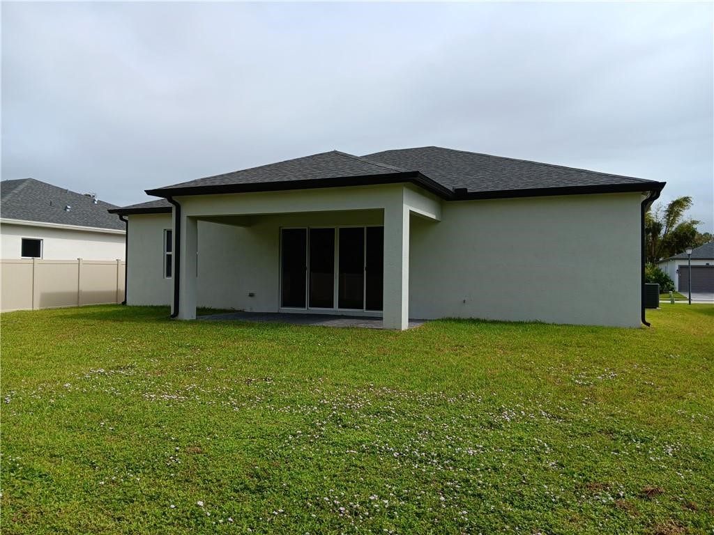 2121 Bridgehampton Terrace Vero Beach, FL 32966 - Photo 33 of 33 a house with a outdoor space