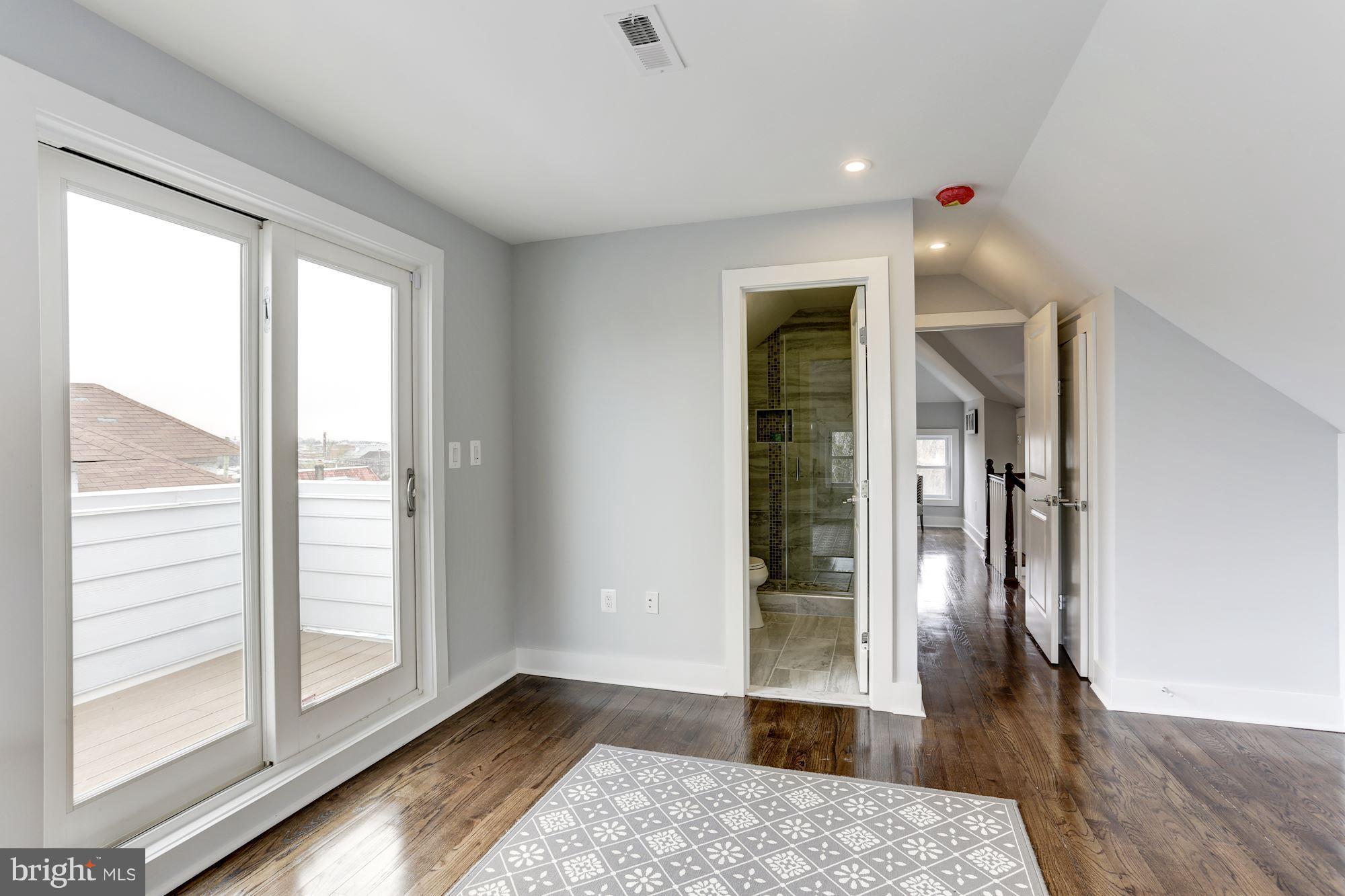 1503 Decatur Street Northwest Washington, DC 20011 - Photo 19 of 29 2nd Master Bedroom w/ En Suite & Deck