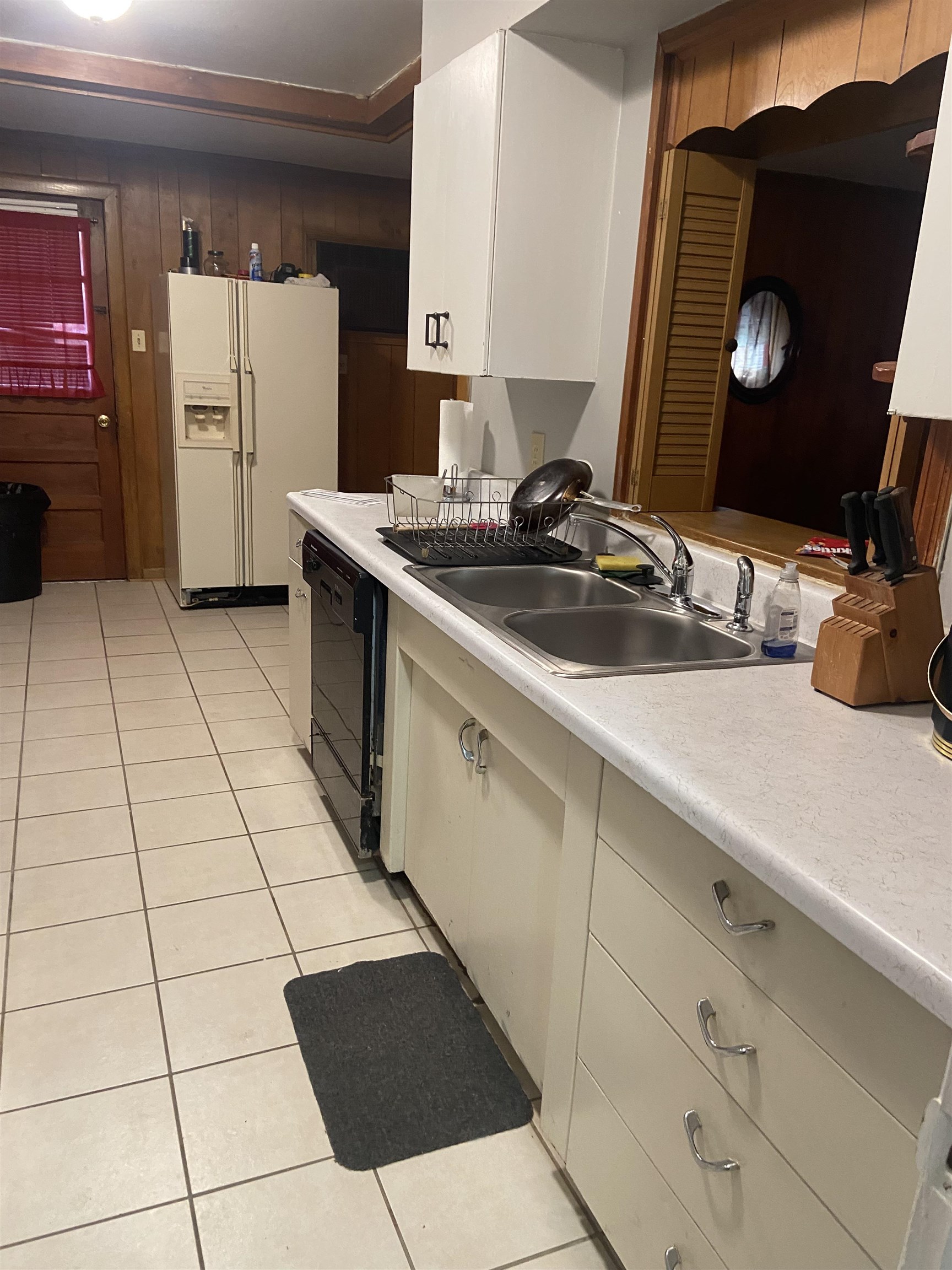1632 Marcia Road Memphis, TN 38117 - Photo 3 of 13 a kitchen with a sink appliances and cabinets