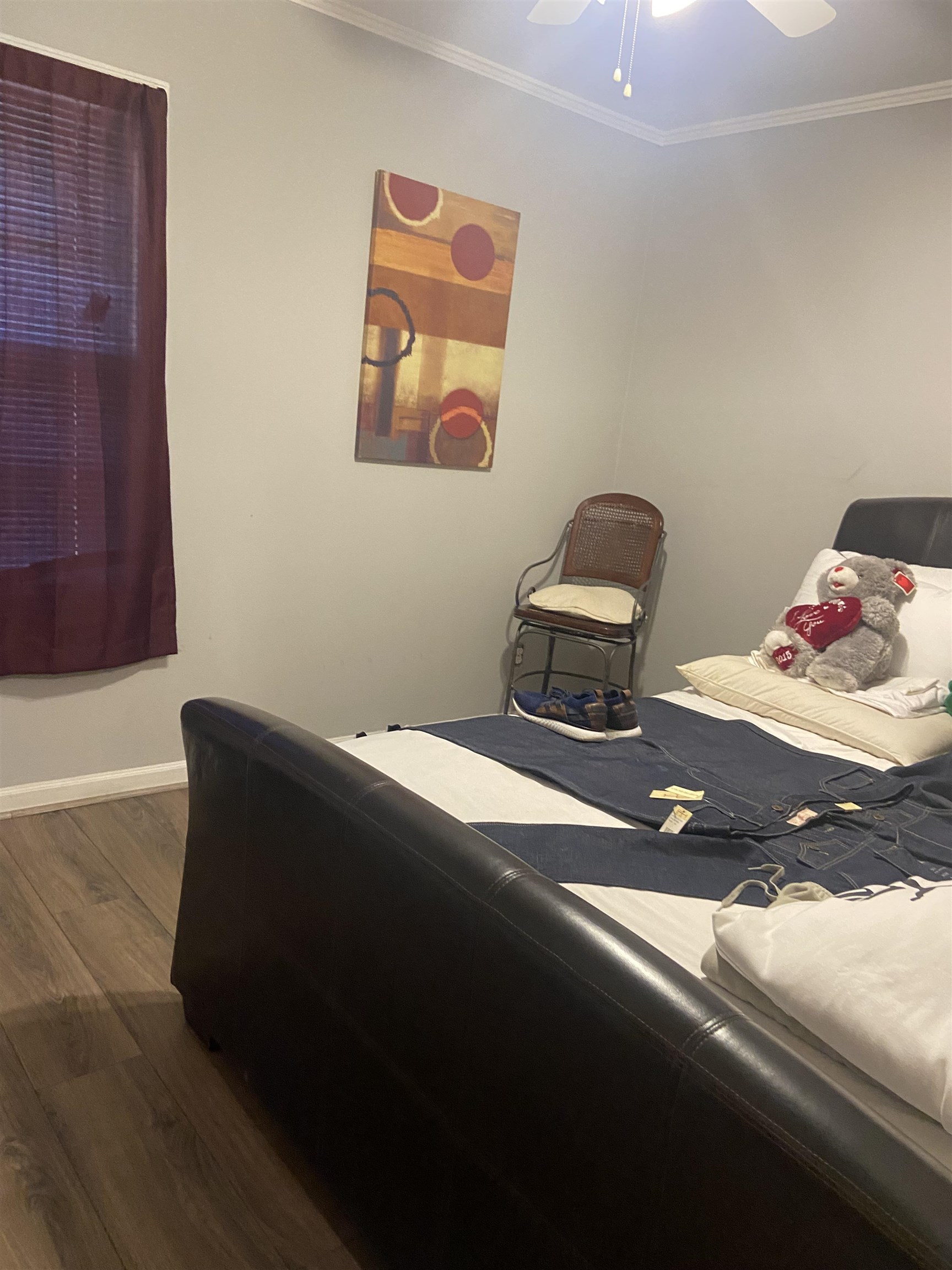 1632 Marcia Road Memphis, TN 38117 - Photo 8 of 13 a bedroom with a bed and teddy bear on bed