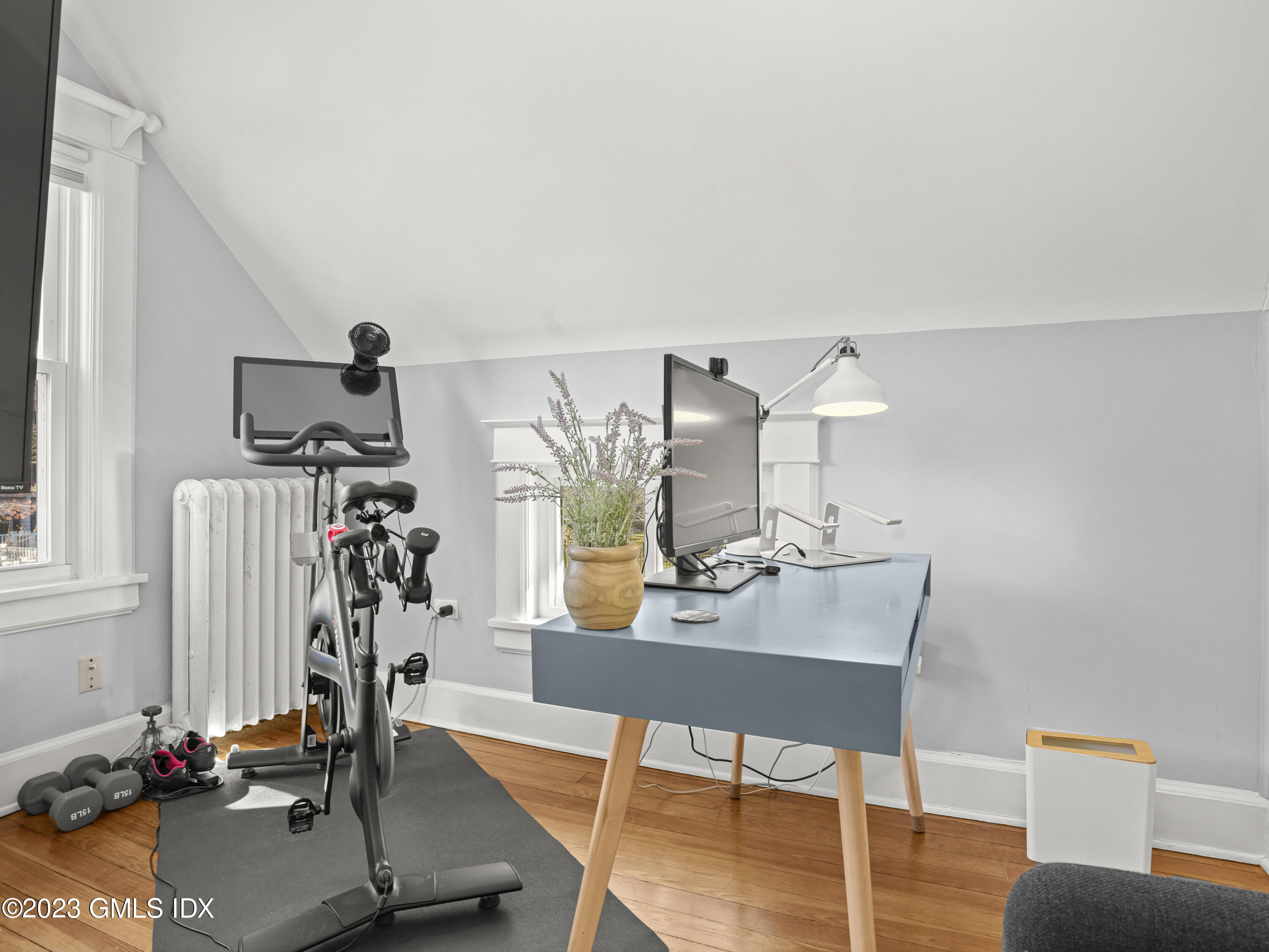 15 Locust Road, Unit COTTAGE Greenwich, CT 06831 - Photo 12 of 25 a view of a workspace with furniture and a window