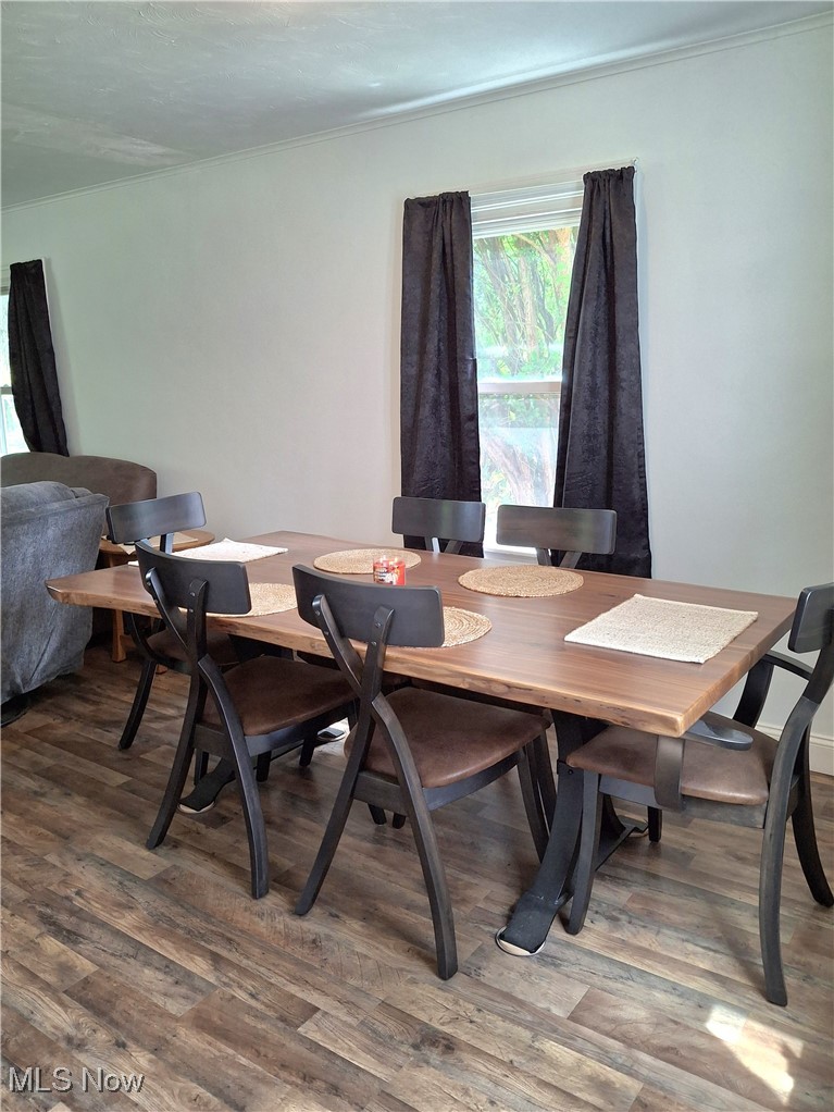 5476 Chippewa Road Medina, OH 44215 - Photo 21 of 30 Dining space with wood finished floors and crown molding