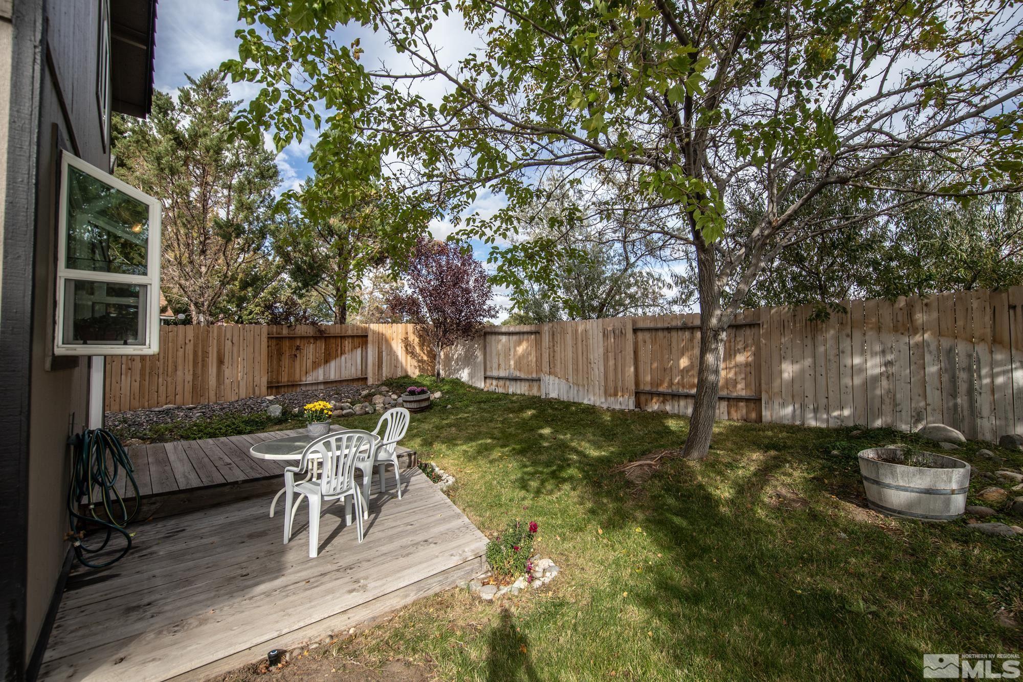 5861 Bankside Way Reno, NV 89523 - Photo 33 of 39 a view of a backyard with a patio