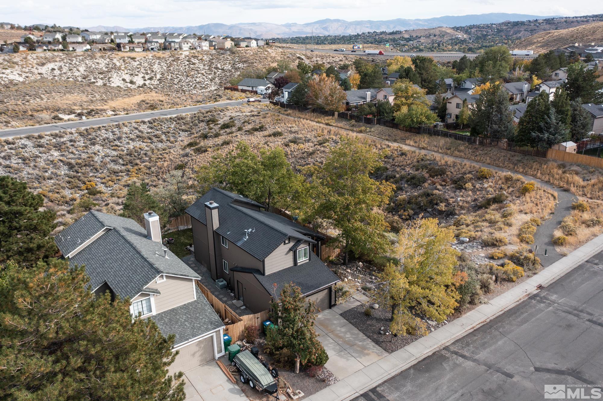 5861 Bankside Way Reno, NV 89523 - Photo 34 of 39 an aerial view of a house with a yard