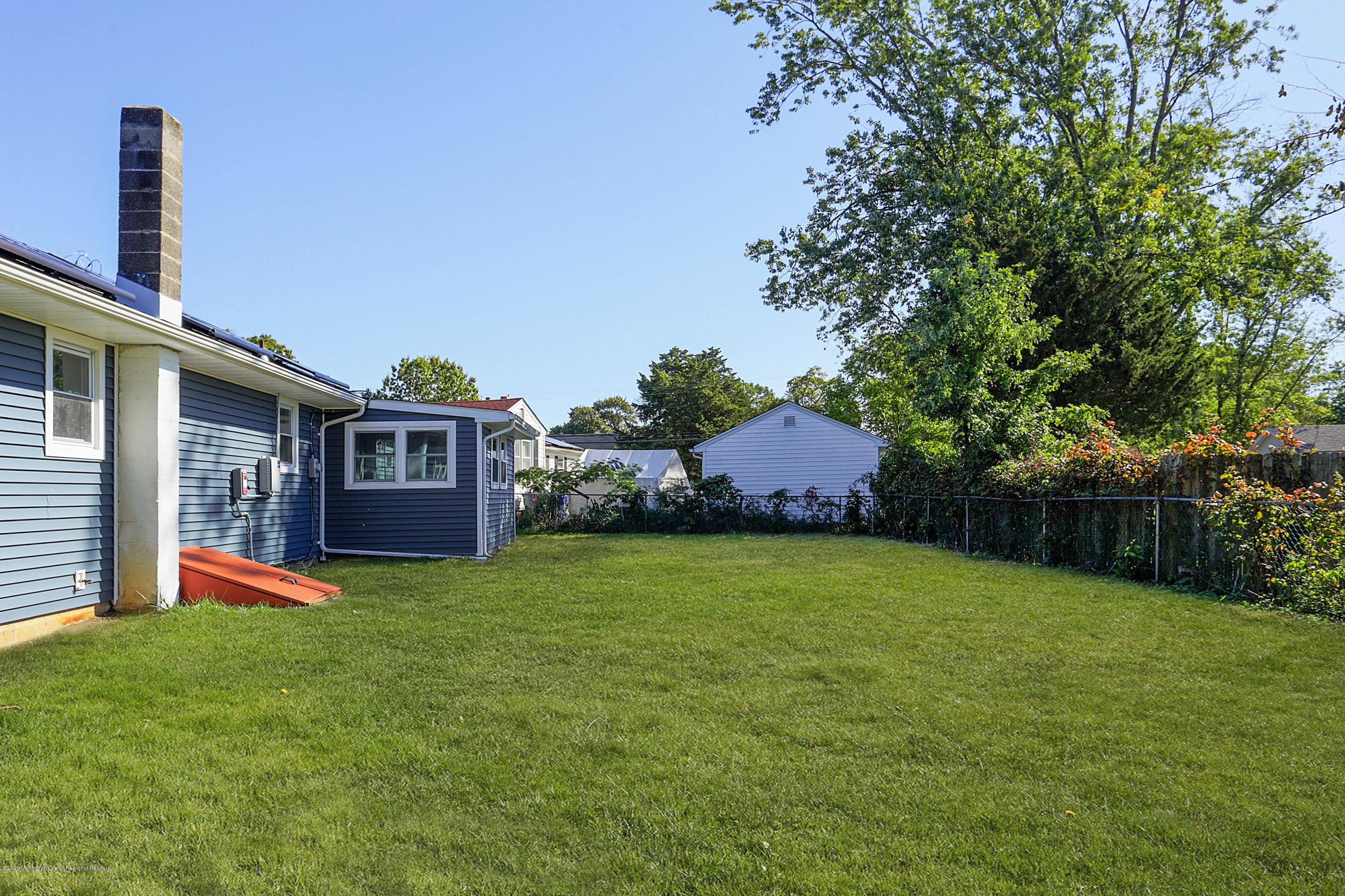 715 Pine Drive Brick, NJ 08723 - Photo 34 of 41 a front view of a house with garden