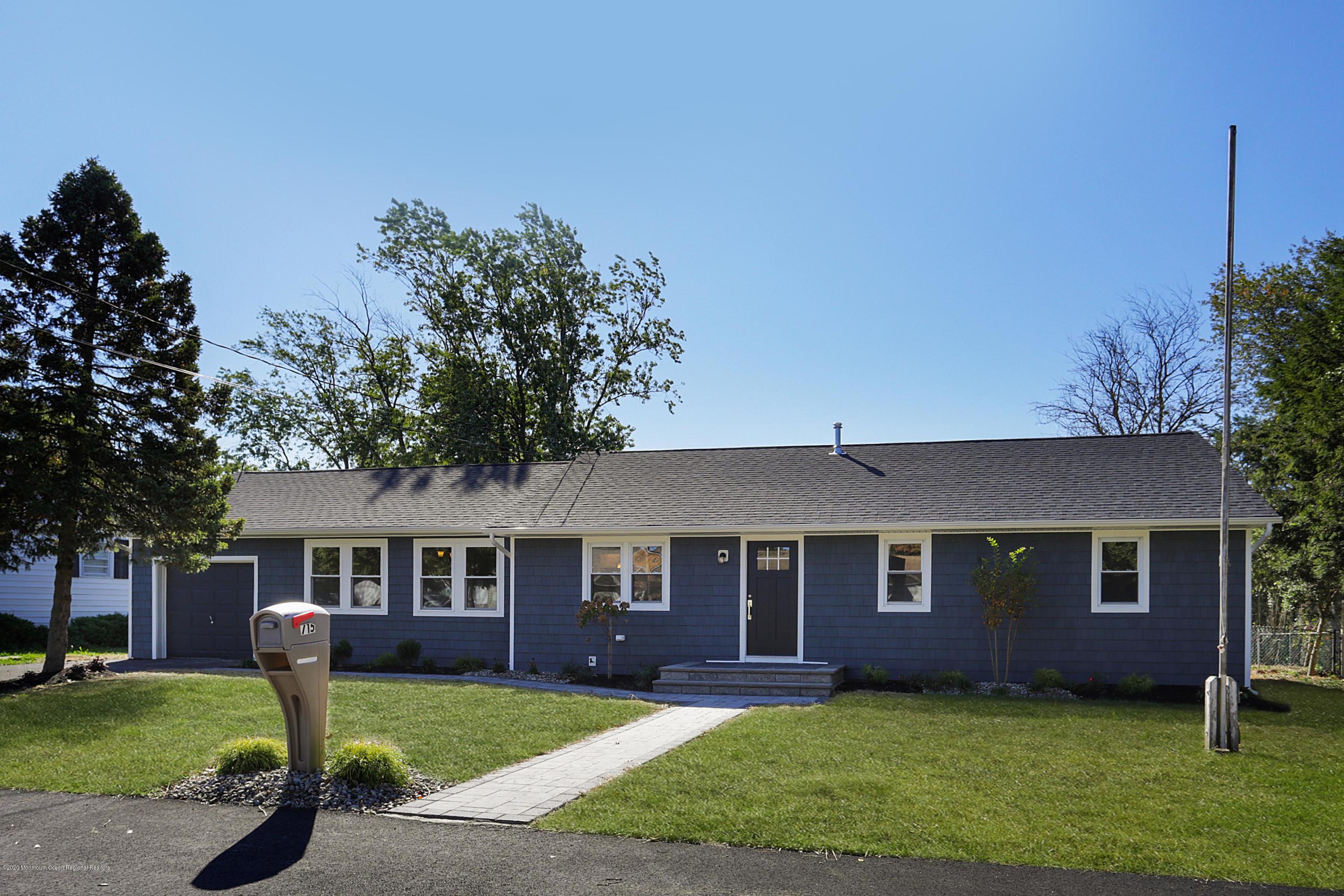 715 Pine Drive Brick, NJ 08723 - Photo 36 of 41 a front view of a house with garden