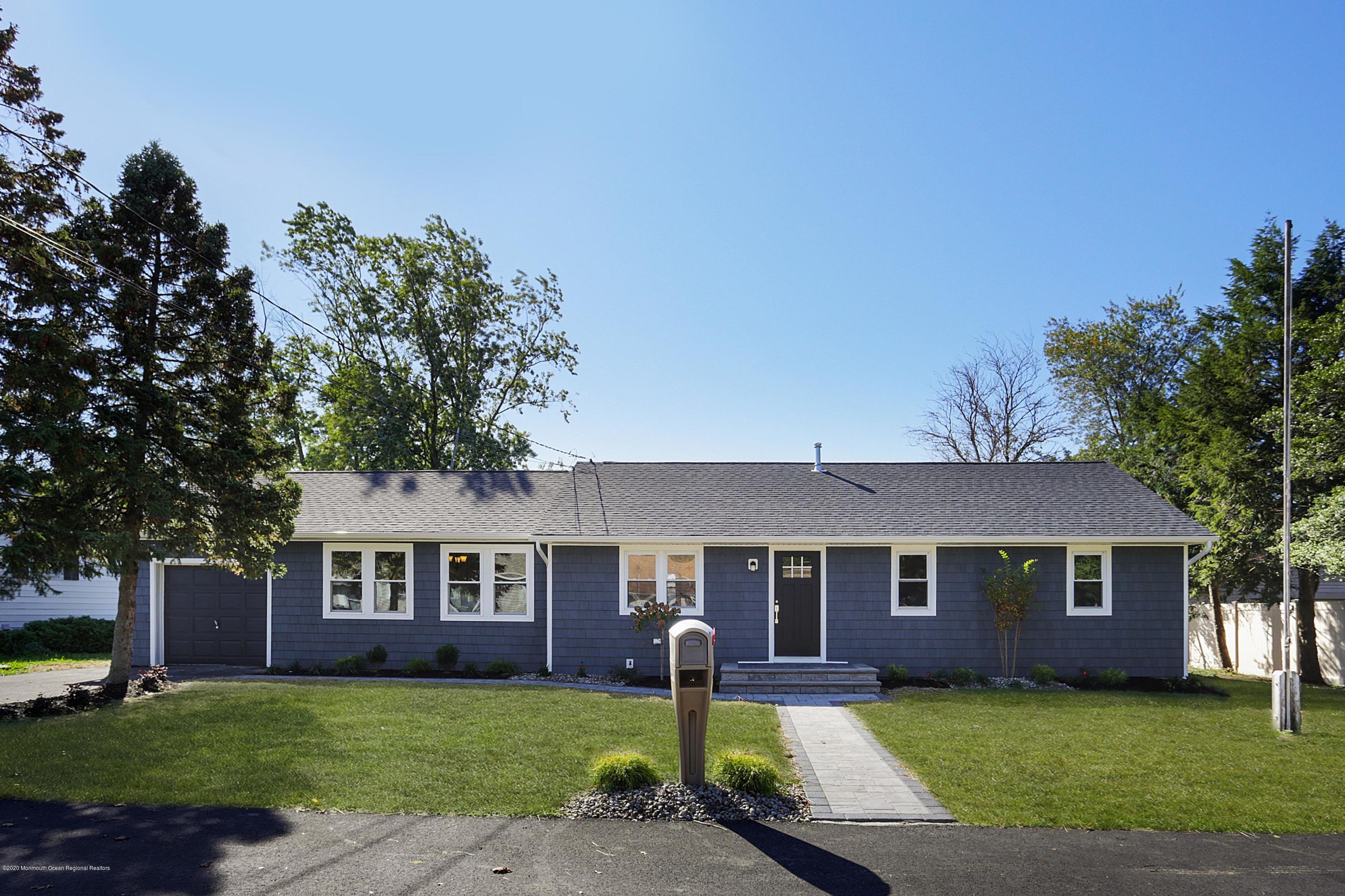 715 Pine Drive Brick, NJ 08723 - Photo 38 of 41 a front view of a house with garden