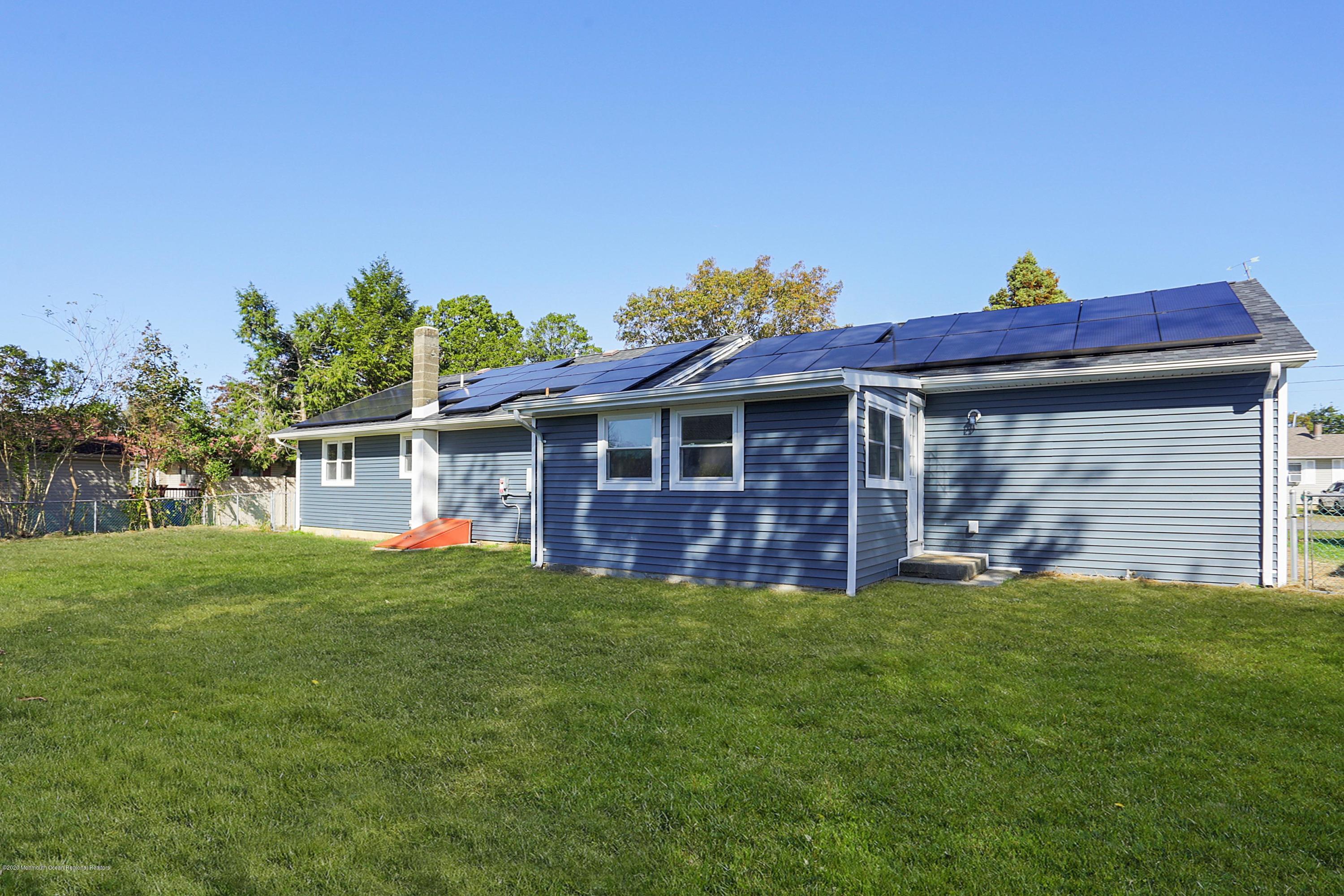 715 Pine Drive Brick, NJ 08723 - Photo 40 of 41 a view of a house with a yard