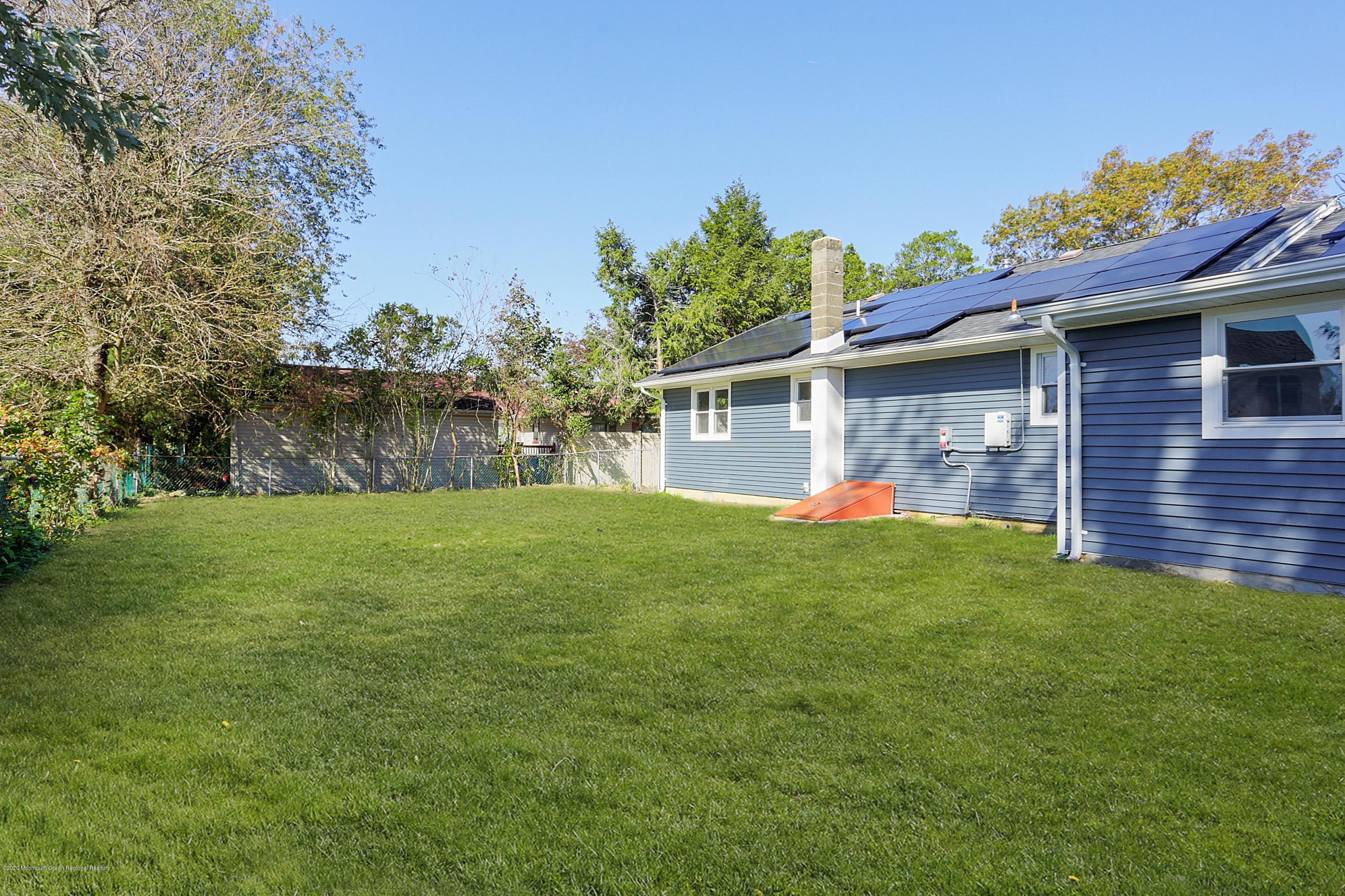715 Pine Drive Brick, NJ 08723 - Photo 41 of 41 a view of a house with a backyard