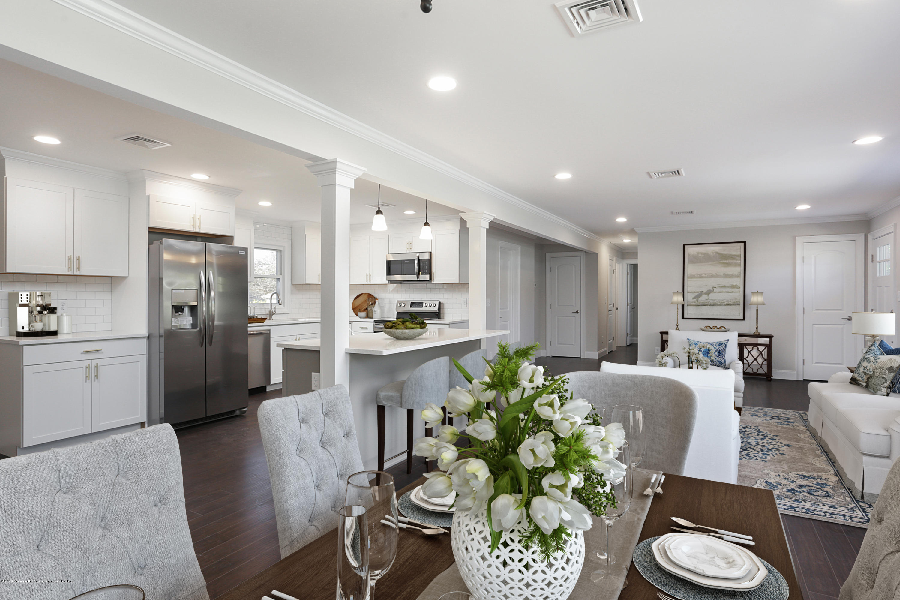 715 Pine Drive Brick, NJ 08723 - Photo 10 of 41 a living room with stainless steel appliances kitchen island granite countertop furniture and a kitchen view
