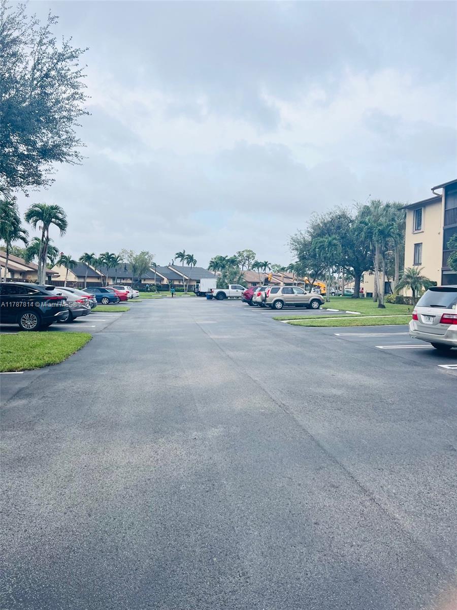 819 Sky Pine Way, Unit D3 Greenacres, FL 33415 - Photo 9 of 11 a view of a street