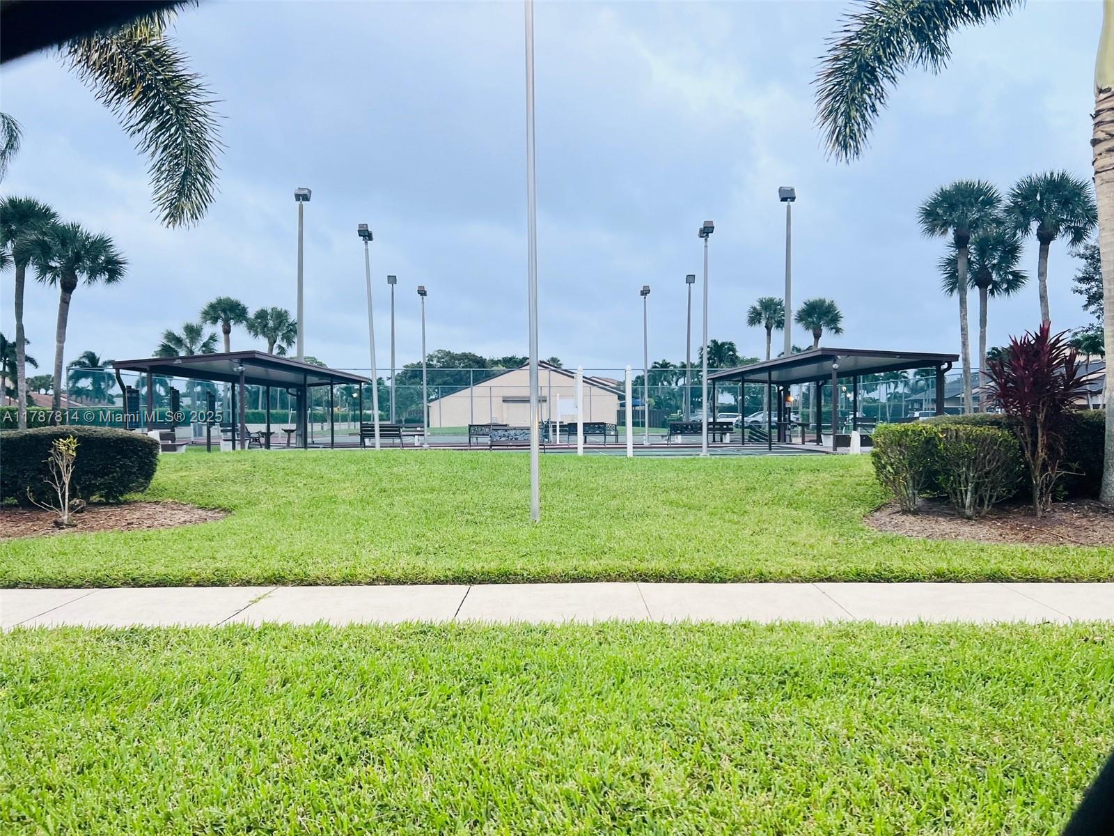819 Sky Pine Way, Unit D3 Greenacres, FL 33415 - Photo 10 of 11 a view of a park with a slide