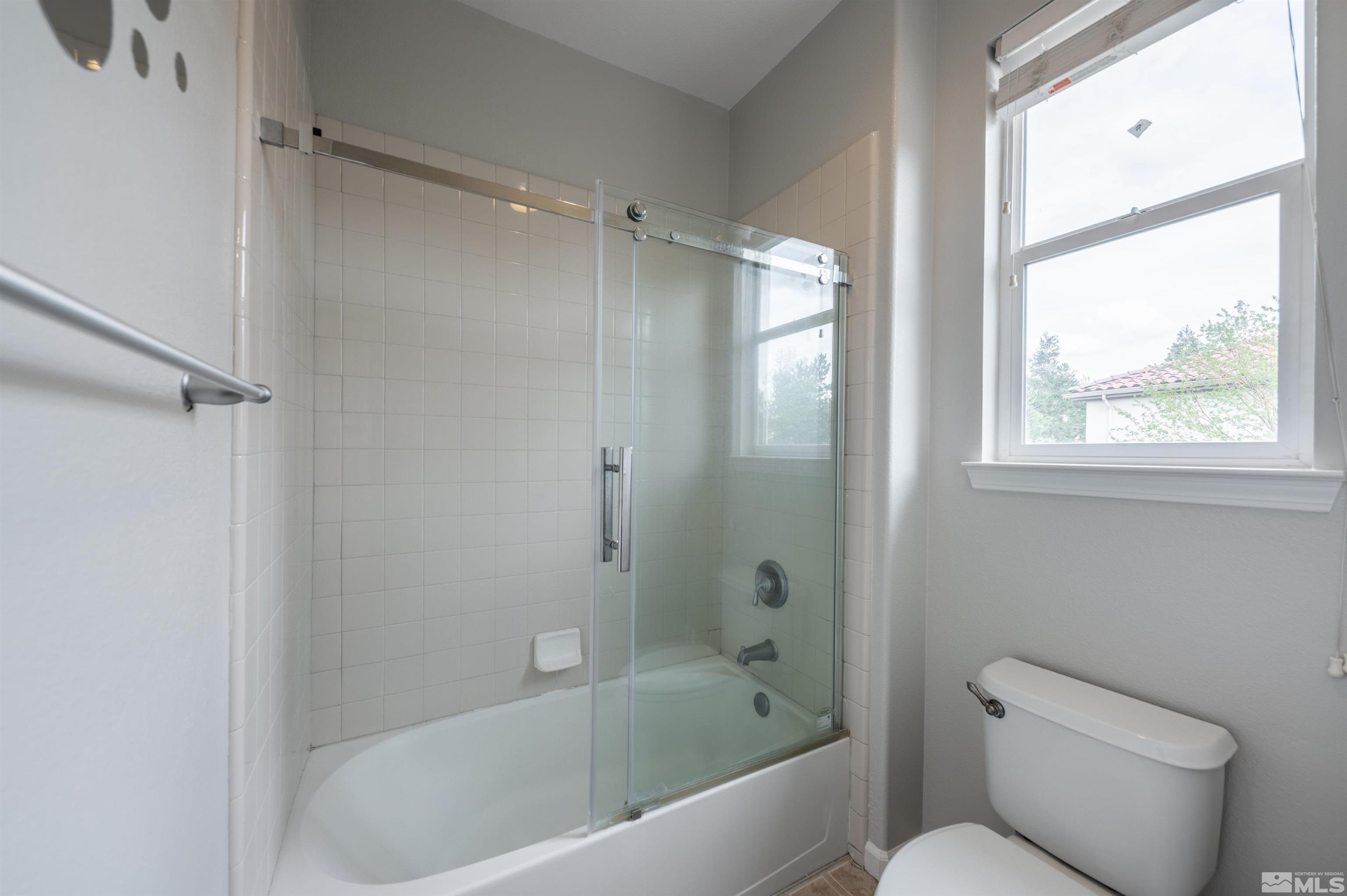 435 Haleb Court Reno, NV 89521 - Photo 21 of 30 a bathroom with a toilet and a bathtub
