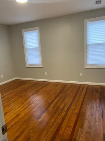 a bathroom with a sink a toilet and bathtub