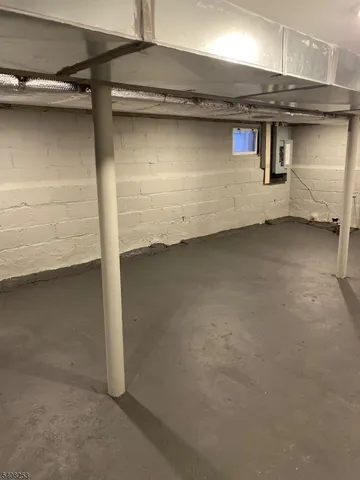 a white toilet sitting next to a shower