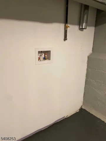 a bathroom with a sink a shower and a mirror