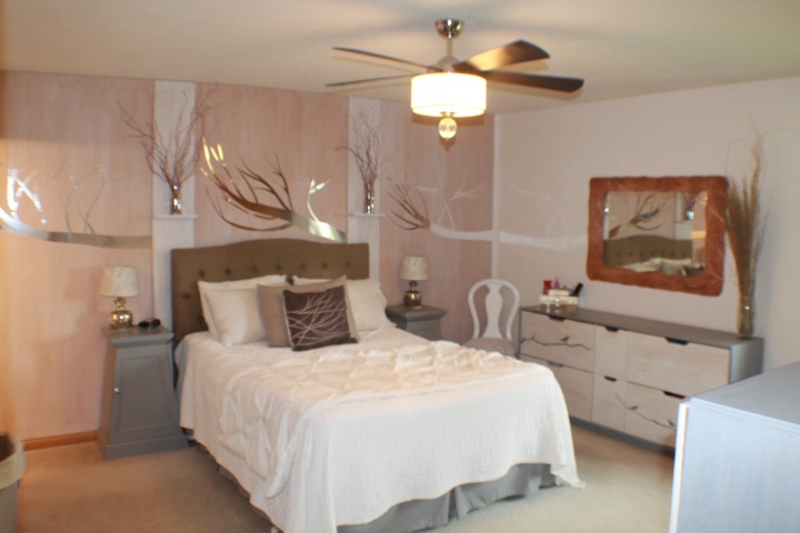 4241 Gloucester Road Roscoe, IL 61073 - Photo 12 of 50 a bedroom with a bed and a chandelier