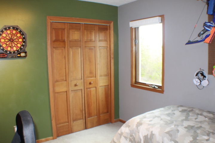 4241 Gloucester Road Roscoe, IL 61073 - Photo 18 of 50 a bedroom with a bed and a window