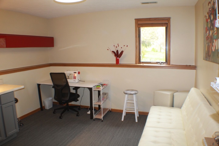 4241 Gloucester Road Roscoe, IL 61073 - Photo 29 of 50 a view of a workspace with furniture and a window