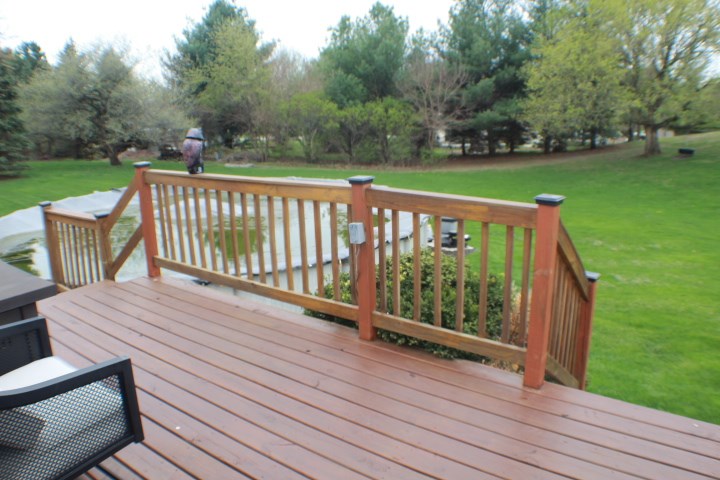 4241 Gloucester Road Roscoe, IL 61073 - Photo 37 of 50 a view of deck and yard with trees