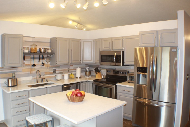 4241 Gloucester Road Roscoe, IL 61073 - Photo 4 of 50 a kitchen with stainless steel appliances a refrigerator sink and cabinets