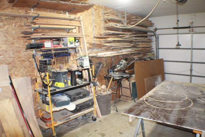4241 Gloucester Road Roscoe, IL 61073 - Photo 48 of 50 a view of a room with racks on the wall