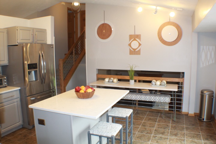 4241 Gloucester Road Roscoe, IL 61073 - Photo 6 of 50 a kitchen with a table and chairs in it
