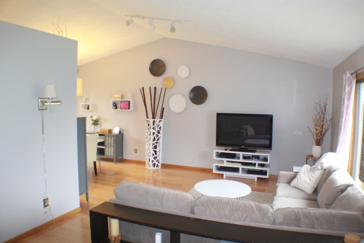 4241 Gloucester Road Roscoe, IL 61073 - Photo 9 of 50 a living room with furniture and a flat screen tv