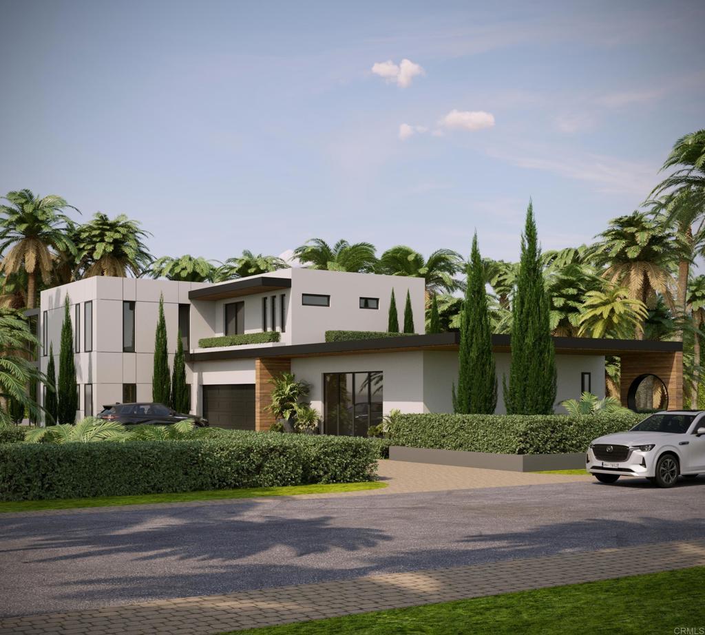 a front view of a house with a garden and a yard