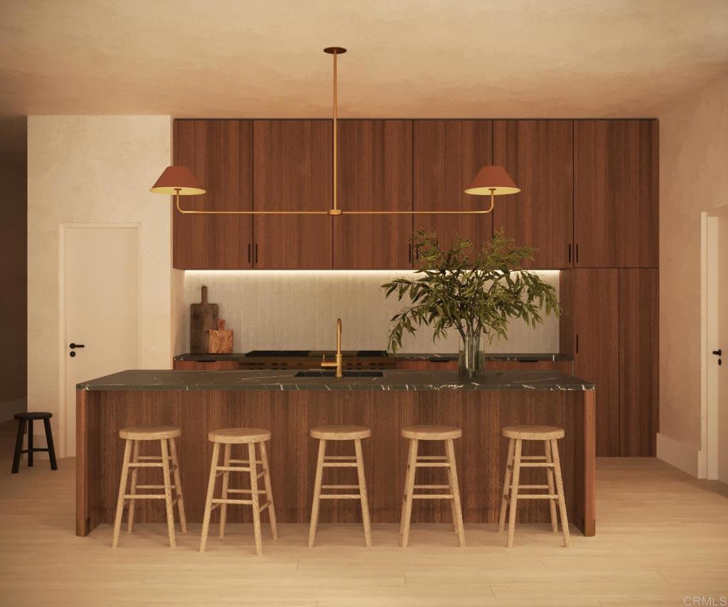 844 Saxony Road Encinitas, CA 92024 - Photo 3 of 12 a view of dining room with furniture and wooden floor