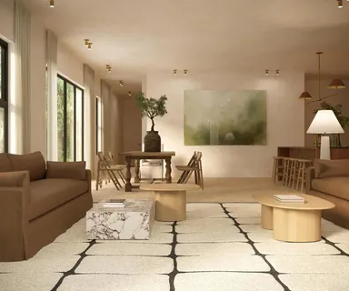 a living room with furniture and a table