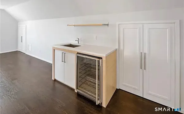a utility room with cabinets