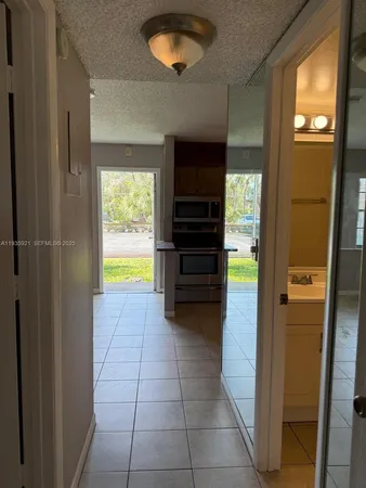 a view of livingroom with kitchen