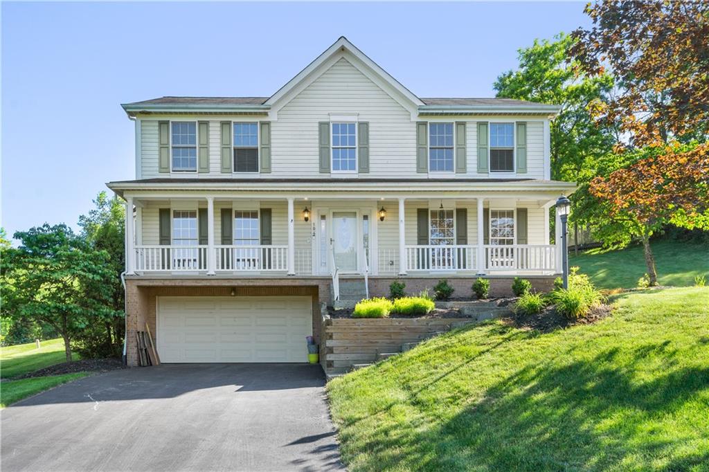 104 Field Club Circle McKees Rocks, PA 15136 - Photo 1 of 25 a front view of a house with garden