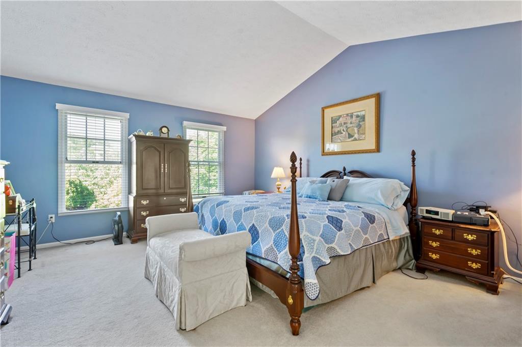 104 Field Club Circle McKees Rocks, PA 15136 - Photo 13 of 25 a bed room with a bed and a couch